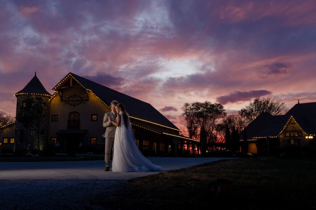 Bride and groom standing outside The English Barn at sunset - perfect for proposal and wedding photography in Westchester NY and CT